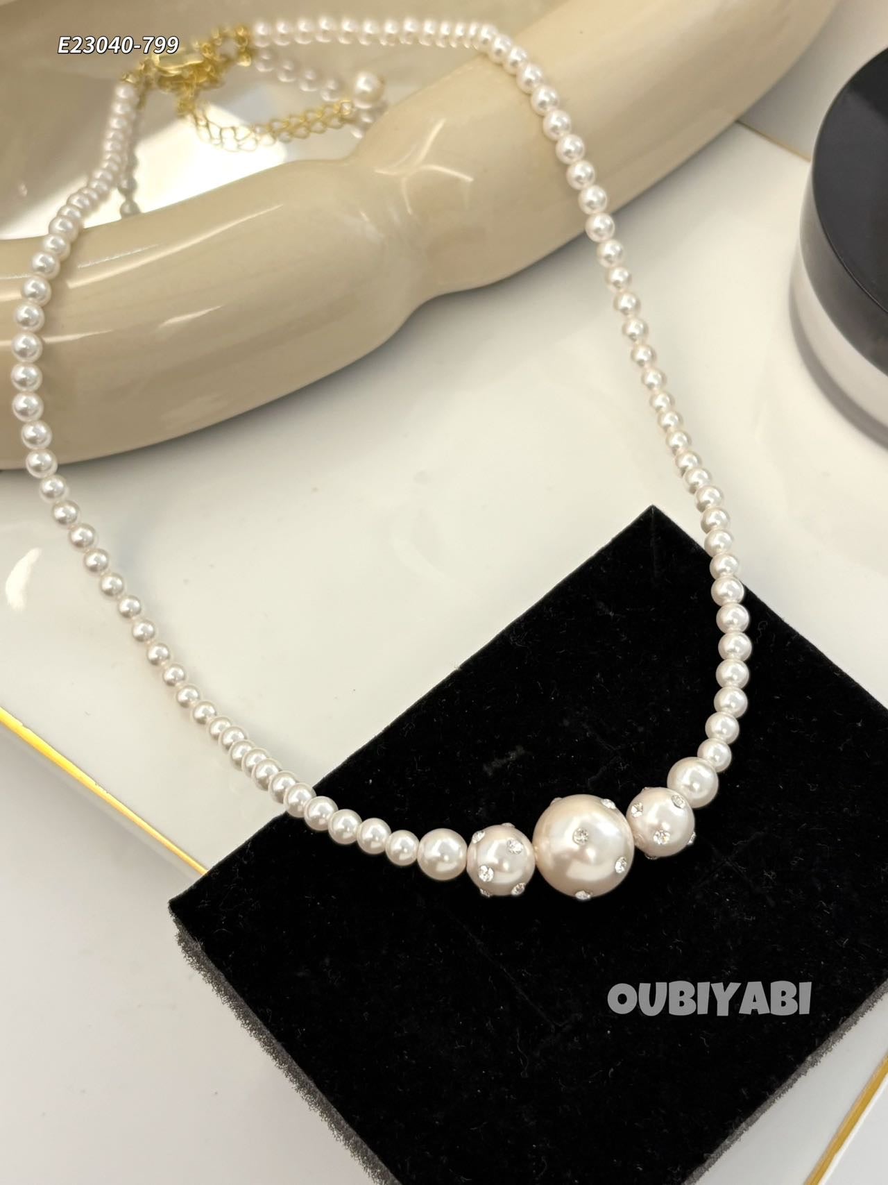 Close up of elegant faux pearl necklace