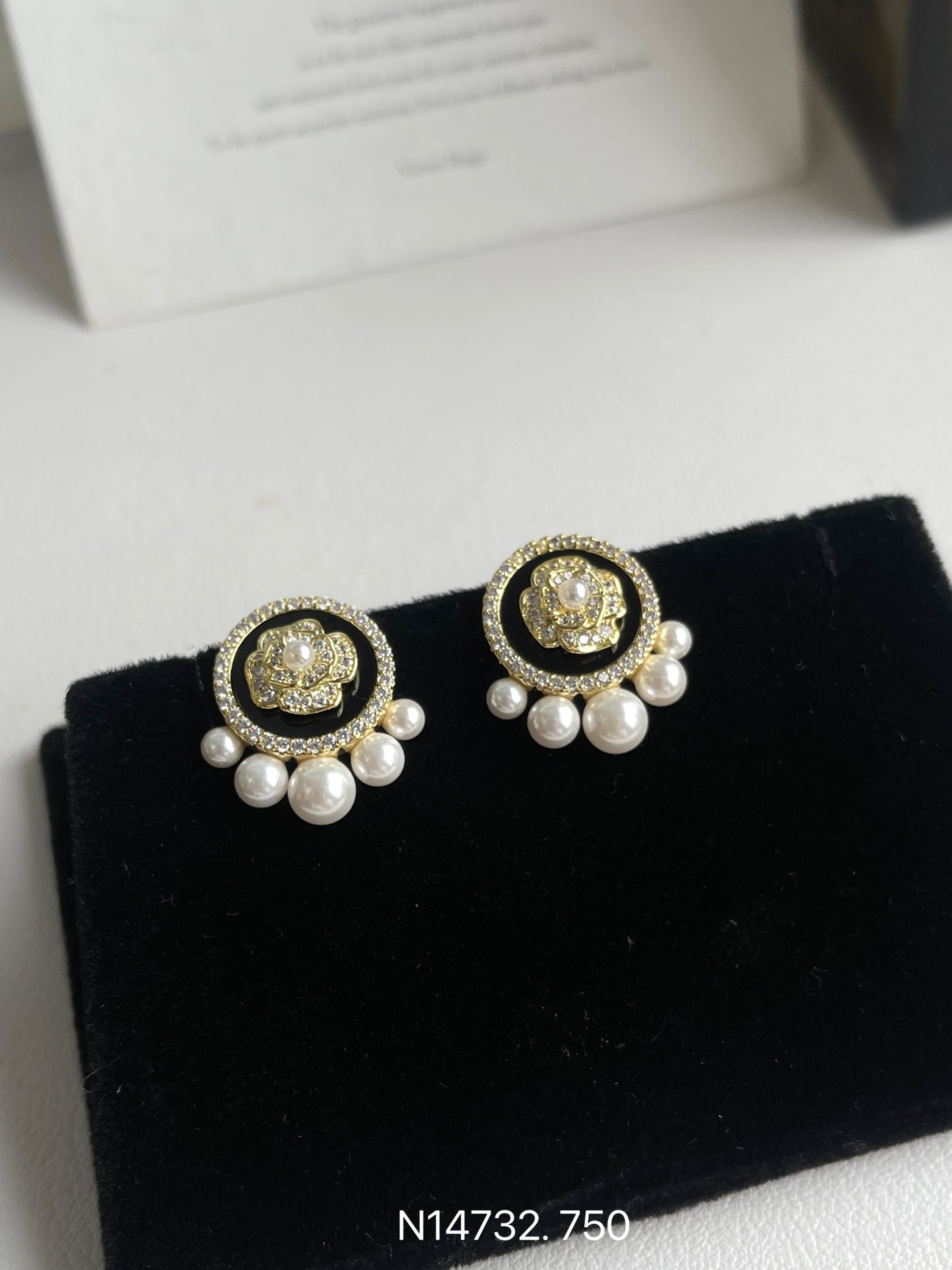 Glamorous round floral earrings with dangling faux pearls