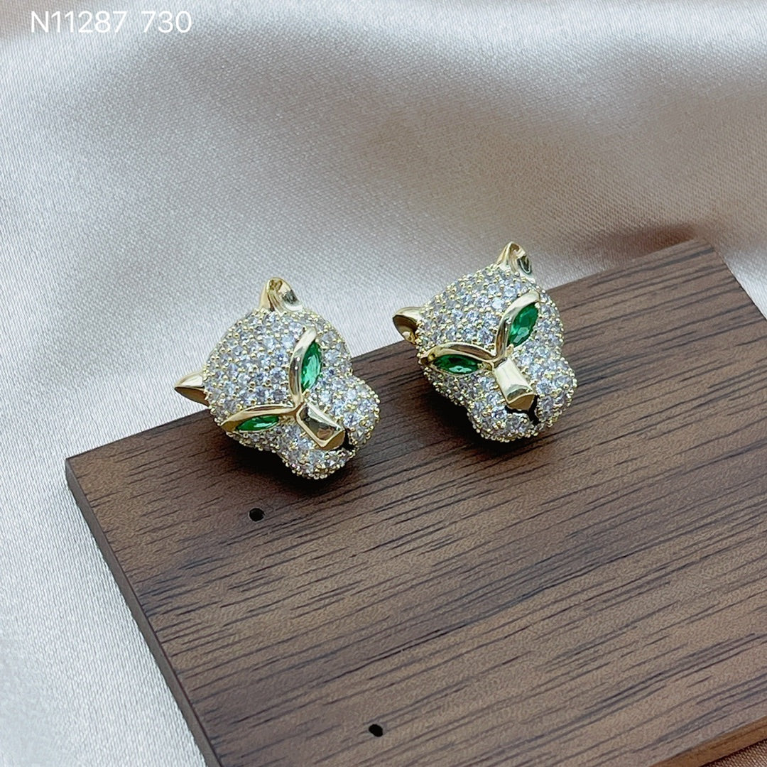 Animal-inspired earrings with luxury sparkle