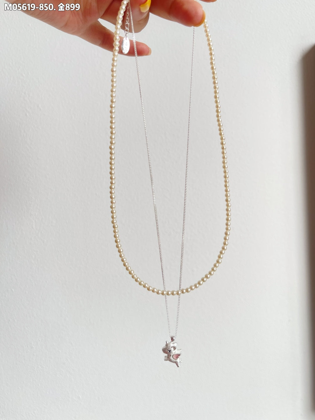 Pearl necklace and cute pony pendant necklace combination