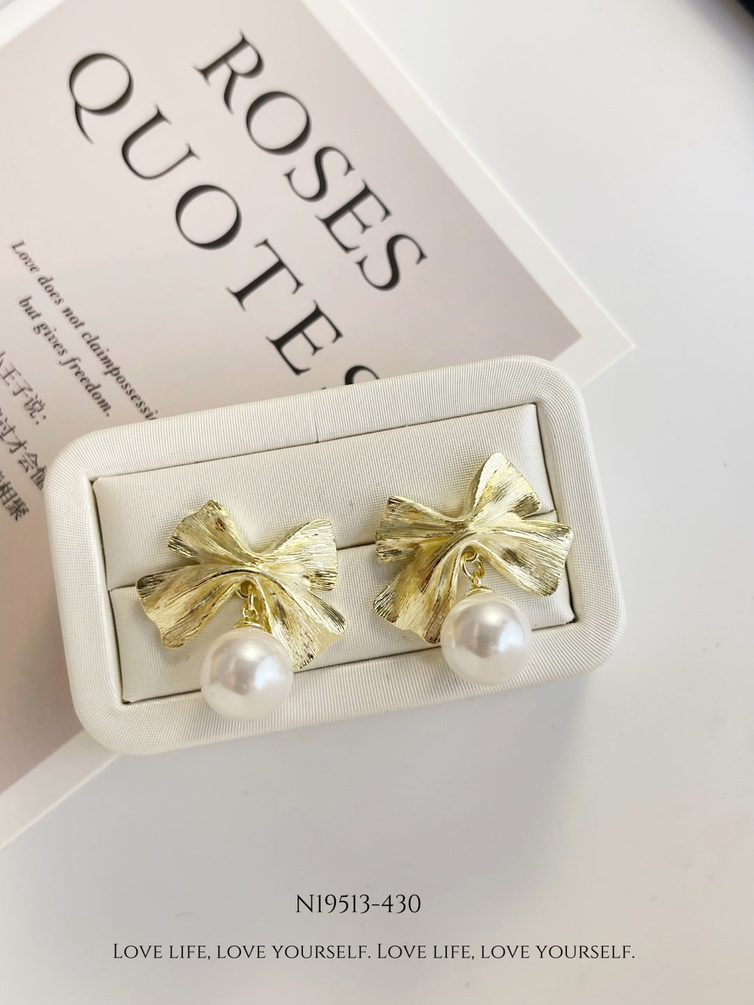 Elegant Pearl Bow Earrings