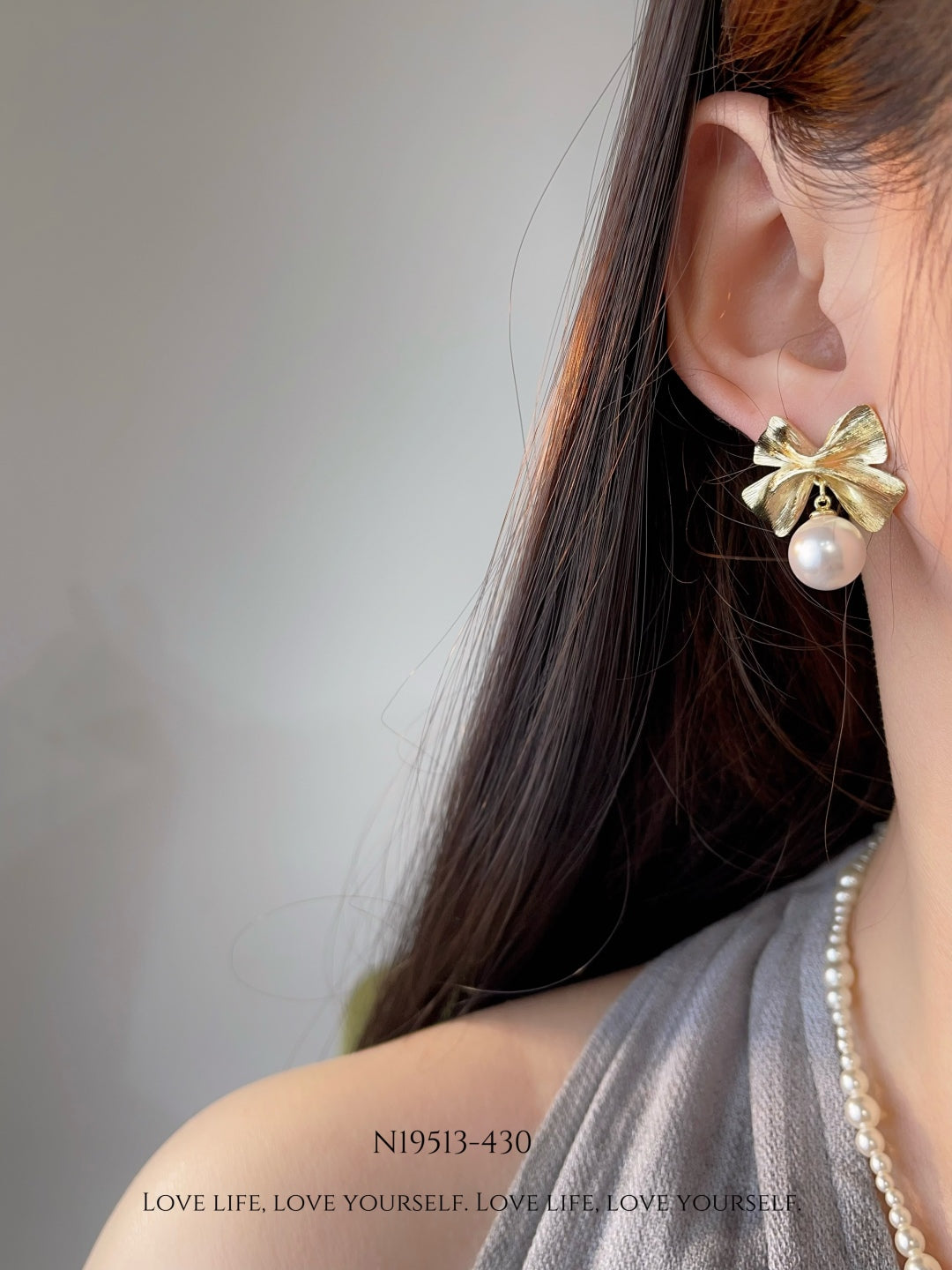 Elegant Pearl Bow Earrings
