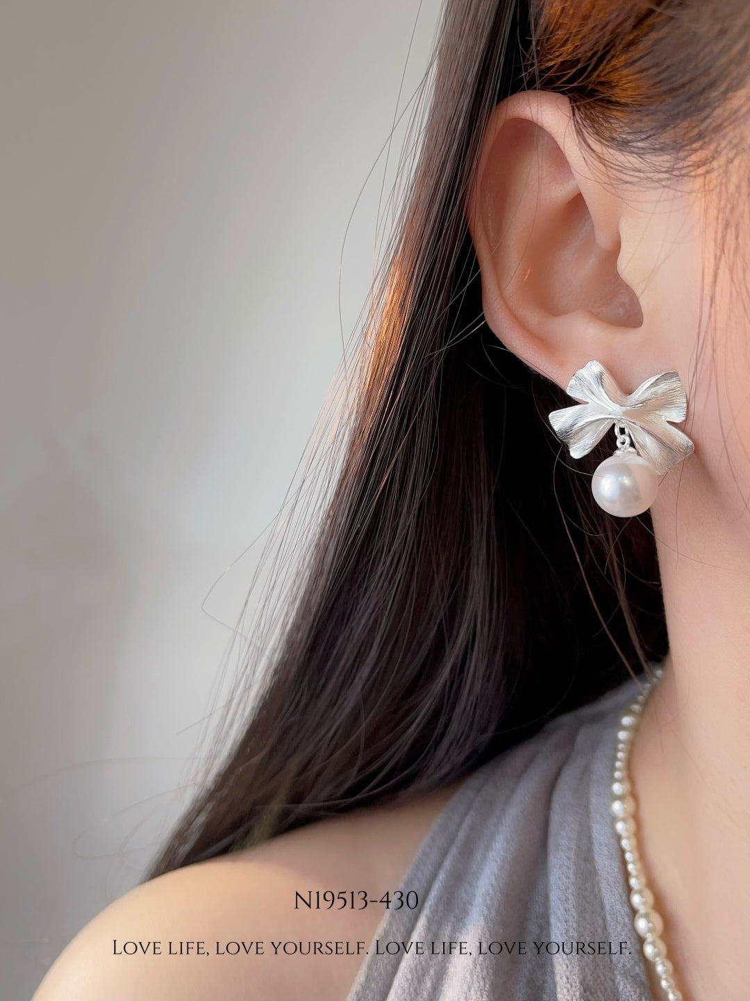 Elegant Pearl Bow Earrings