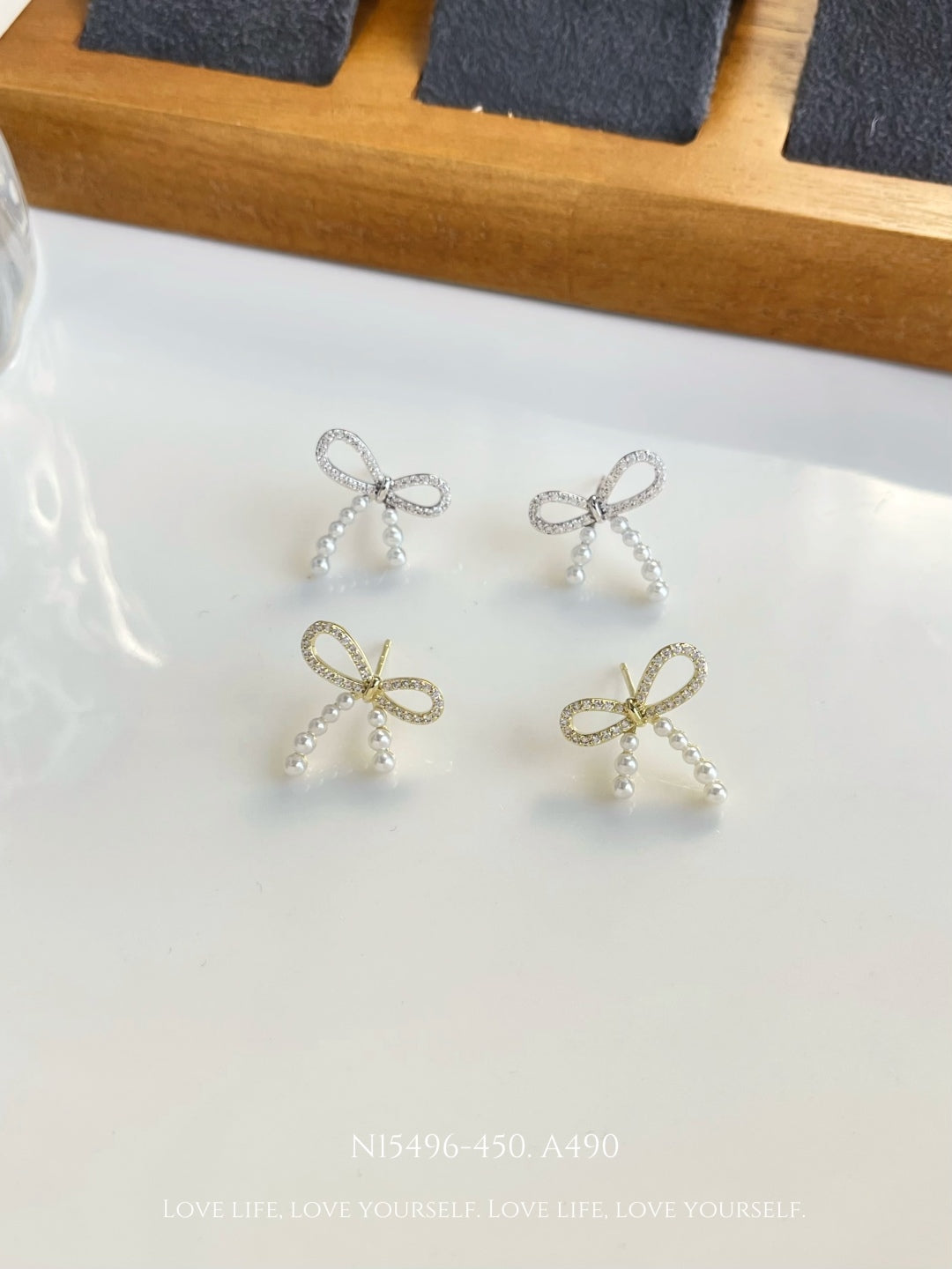 Elegant Pearl Bow Stud Earrings