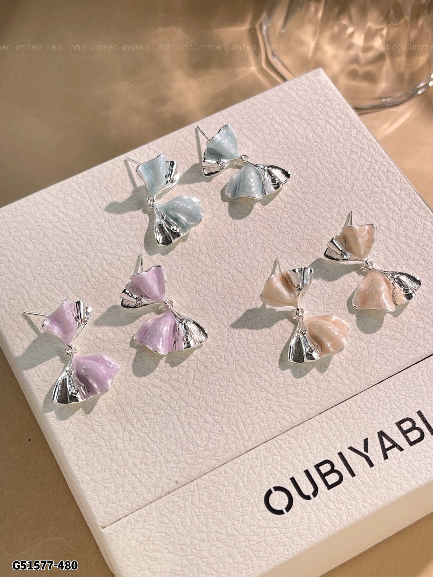 Inverted bow earrings