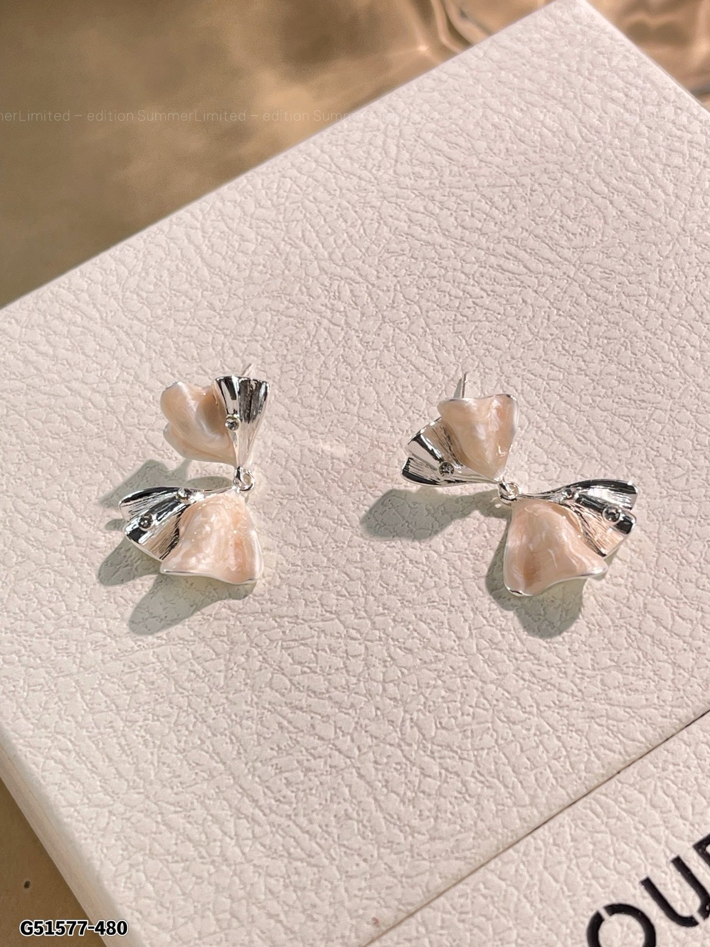Inverted bow earrings