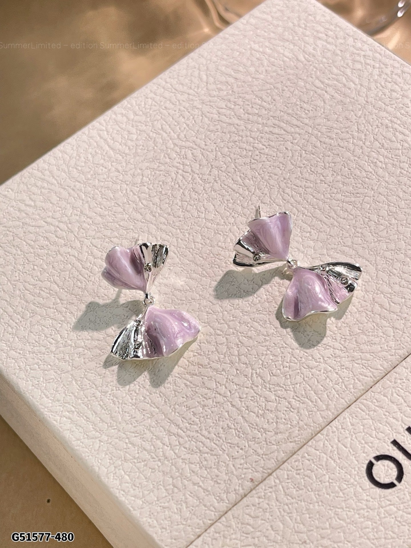Inverted bow earrings