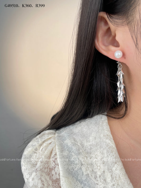 Shiny silver drop earrings with botanical leaf design