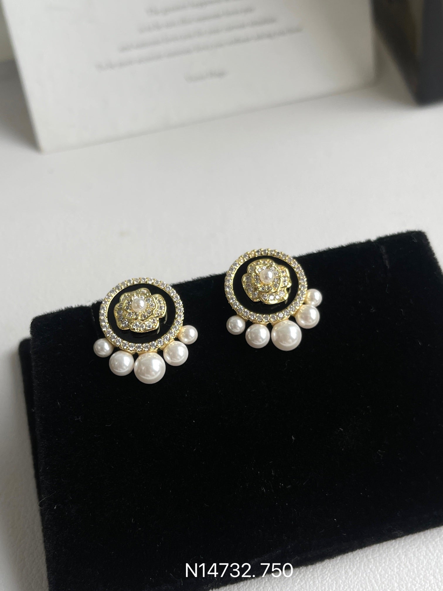 Glamorous round floral earrings with dangling faux pearls