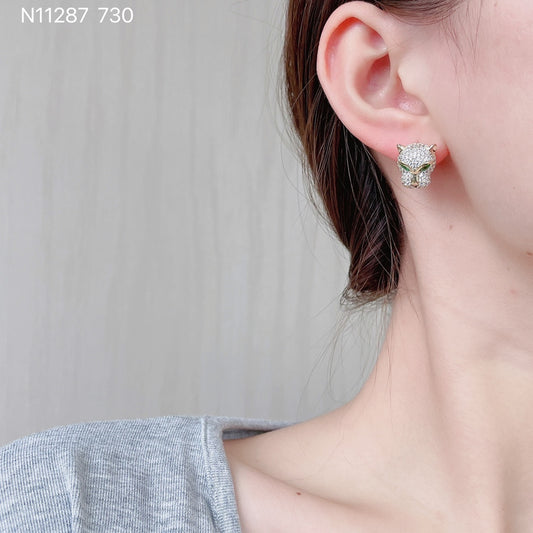 Animal-inspired earrings with luxury sparkle