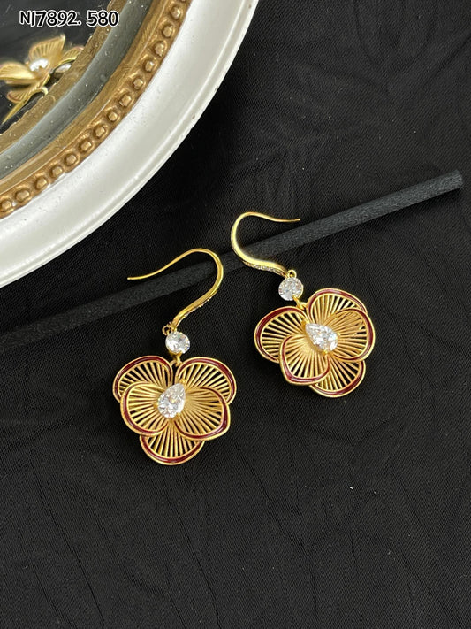 Detailed gold metal flower earrings
