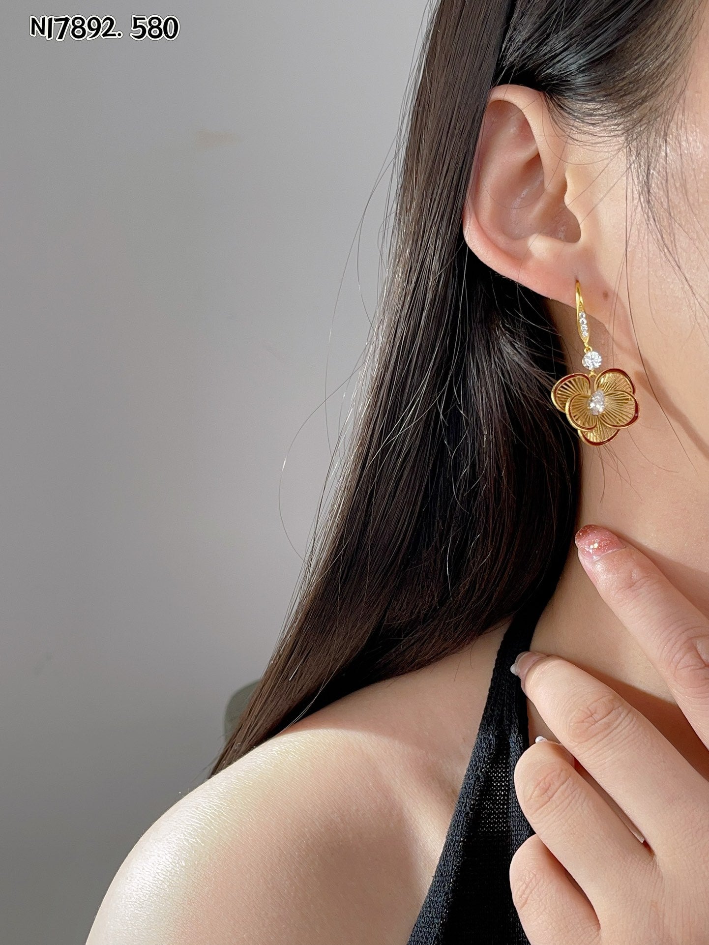 Detailed gold metal flower earrings