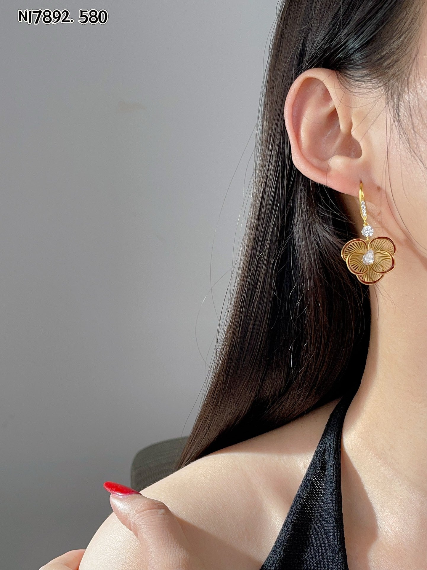 Detailed gold metal flower earrings