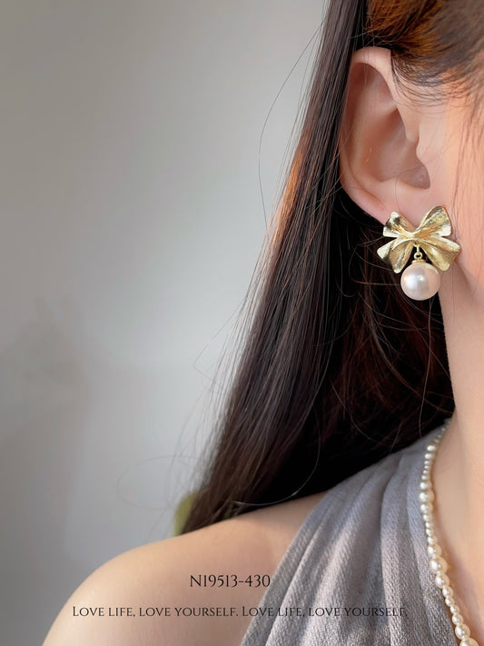 Elegant Pearl Bow Earrings