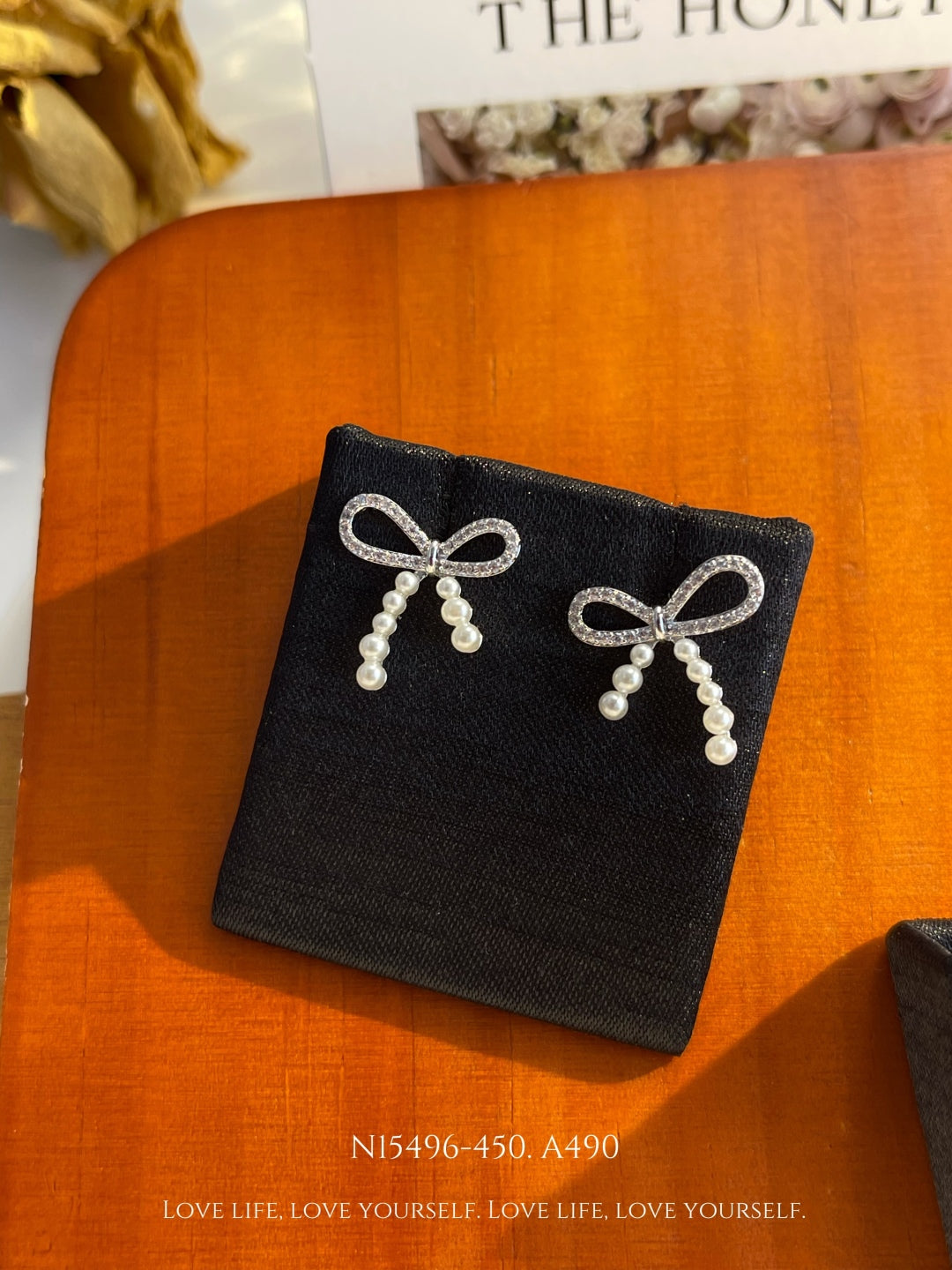Elegant Pearl Bow Stud Earrings