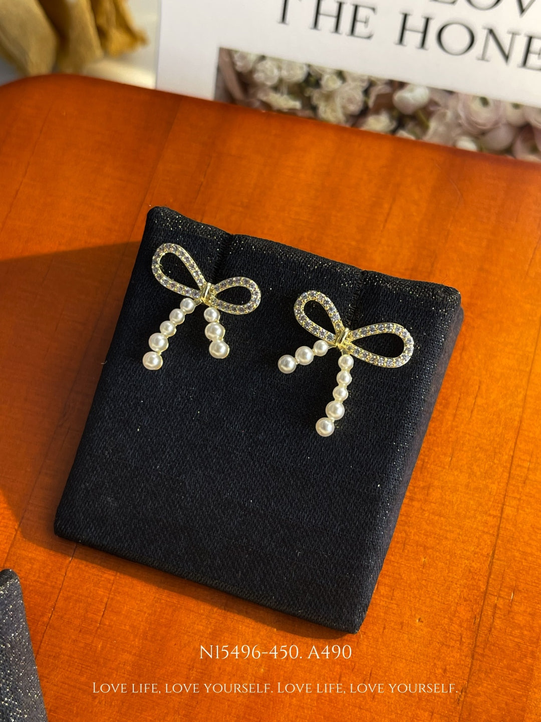 Elegant Pearl Bow Stud Earrings