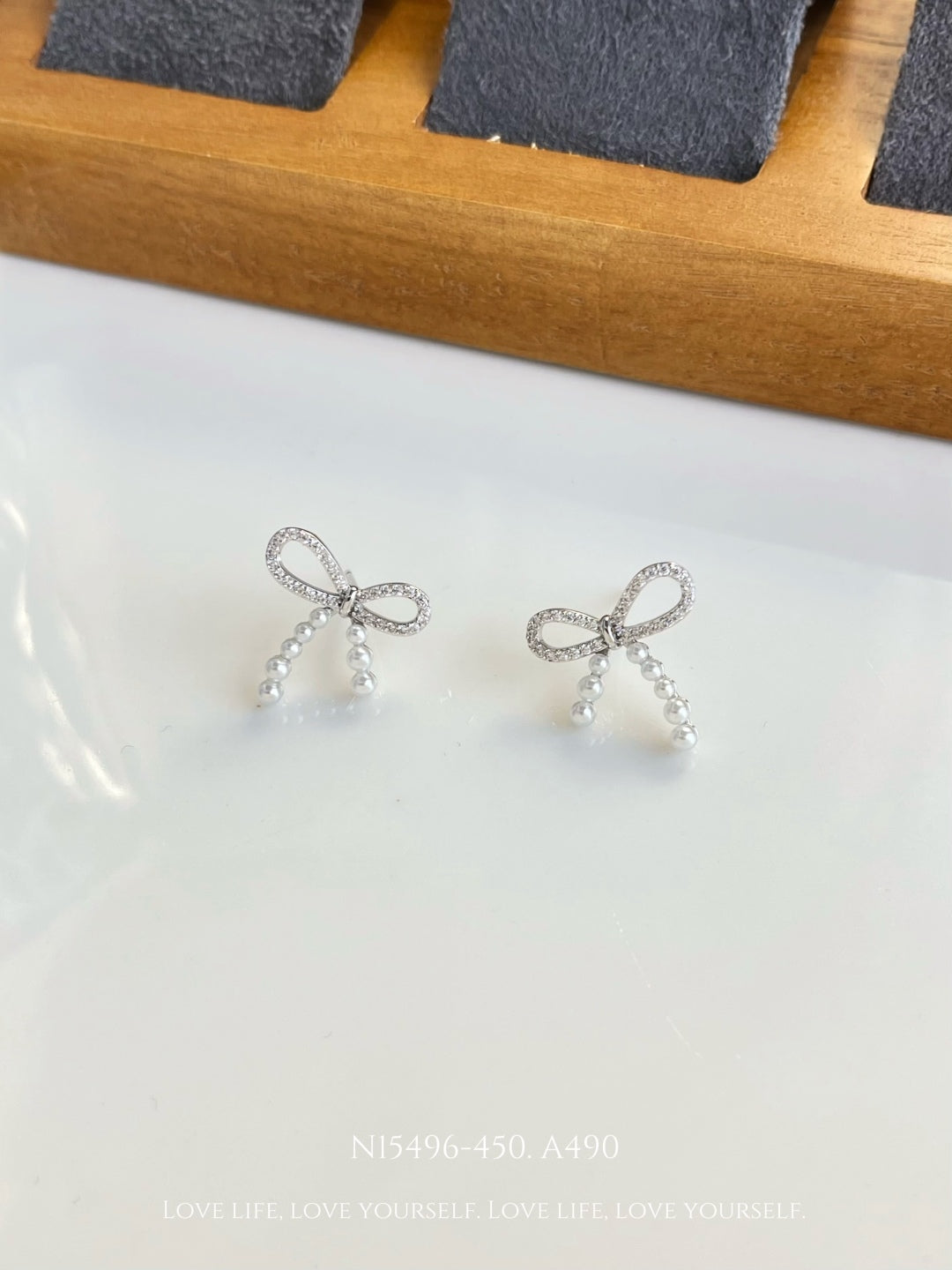 Elegant Pearl Bow Stud Earrings