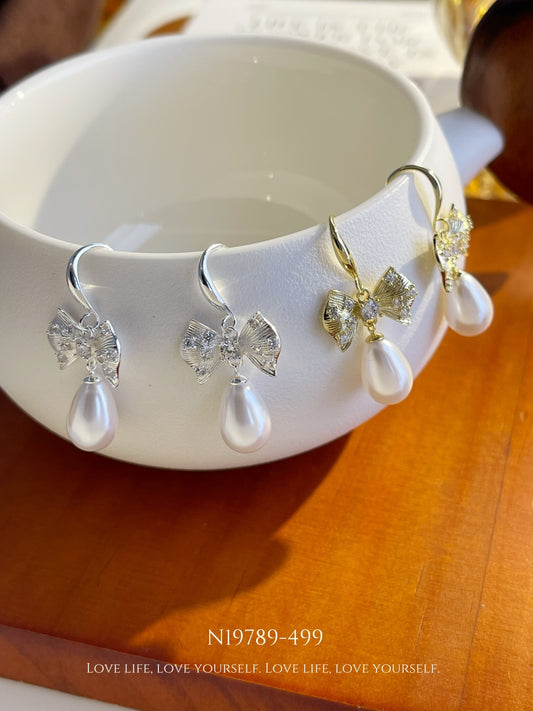 Crystal Bow & Teardrop Pearl Dangle Earrings